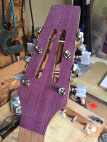 Mounting the tuners onto the 8 string head.