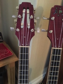 The finished heads showing the slots for half of the 8 strings.