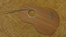 The first task is to fit the purfling into the channel around the soundhole.